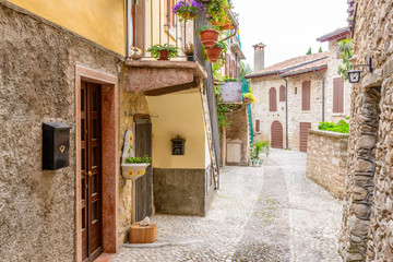 Picturesque small town street view in Malchesine, Lake Garda Italy.