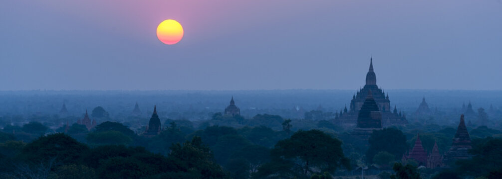 Pagoda under a warm sunset in the plain of Bagan, Myanmar (Burma)