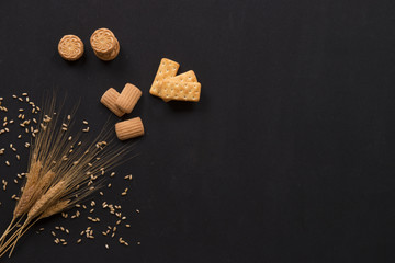 Fototapeta na wymiar biscuit and wheat background