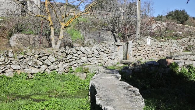a pedestrian stone made bridge in a rural place - Castelo Bom, Guarda, Portugal