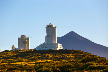 Telescopes of the Astronomical Observatory Izana with Volcano El Teide in the background, Spain