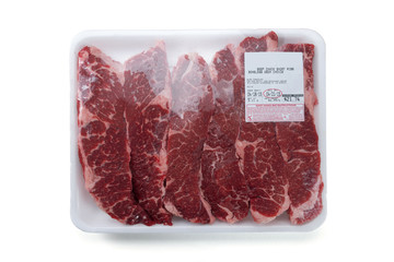 Fresh red meat packed in a poly bag.  