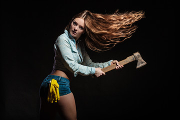 Feminist woman with hatchet.