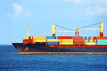 Container stack on freight ship in Black sea, Odessa, ukraine