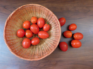 tomatoes on a wooden base
