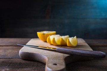 lemons cut on a cutting board