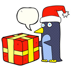 comic book speech bubble cartoon christmas penguin with present