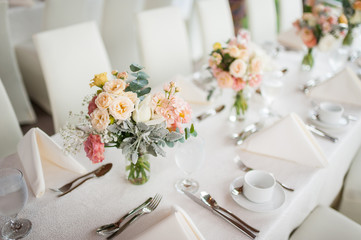 Beautiful flowers as dining table decoration