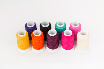 Colorful waxed cord isolated on white background