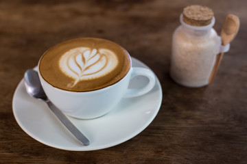 Hot art Latte Coffee in the table