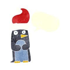 retro speech bubble cartoon penguin in christmas hat