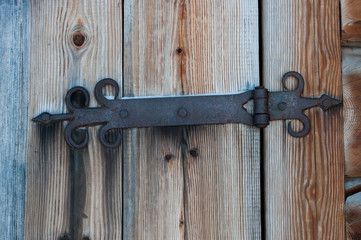 old rusty hinge on the door