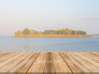 Fototapeta na wymiar Vintage wooden board empty table in front of blue sea & sky background. Perspective wood floor over sea and sky - can be used for display or montage your products. beach & summer concepts.