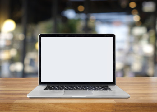 Blank screen laptop on table