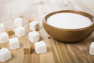 Sugar in a wooden bowl