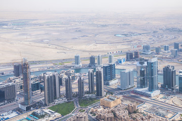 Fototapeta na wymiar DUBAI, UNITED ARAB EMIRATES -MARCH 17,2015 : Modern skyscrapers in Dubai (emirate and city). Dubai now boasts more completed skyscrapers higher than other city.,taken on 17 MARCH 2015 in Dubai