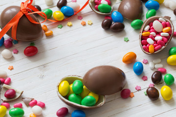 Chocolate Easter Eggs Over Wooden Background