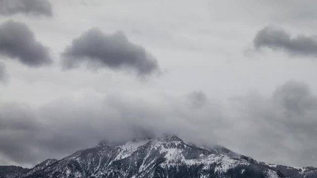 Timelapse of the mist and clouds in winter from Schafberg mountain in Austria