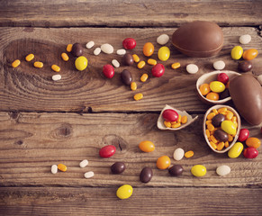 Chocolate Easter Eggs Over Wooden Background