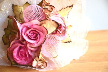 bundle rose from paper
