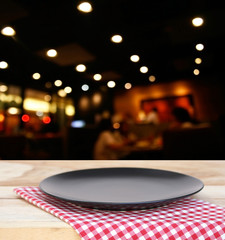 the plate on checkered tablecloth