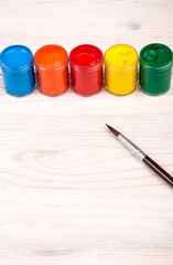 Color paints with brush portrait view