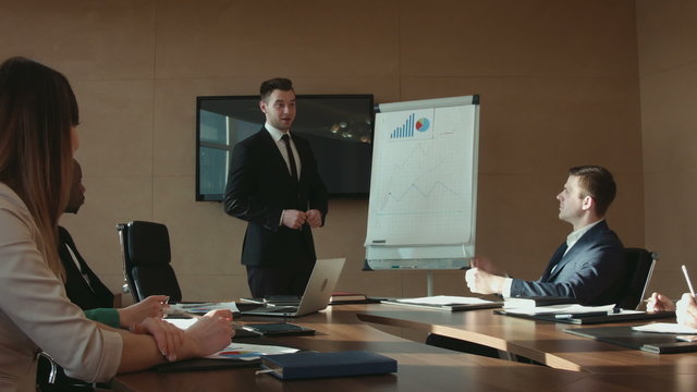 Businessman with tablet at meeting