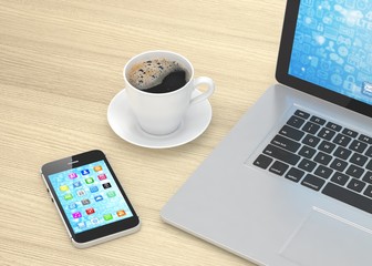 Laptop smartphone and coffee cup 