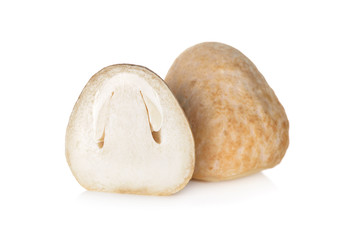 whole and half cut straw mushroom on white background