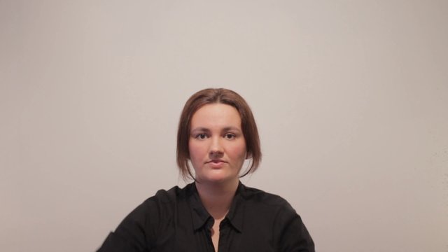 Woman Giving Excellent Proposal with Board
