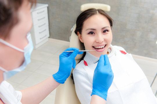 Young female patient at dentist office