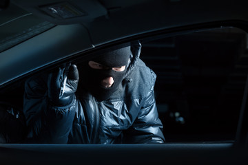 Car robber at night