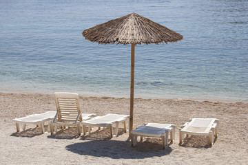 Beach Umbrella and Sunbeds