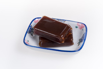 Sweet Bean Jelly on small dish isolated on white background