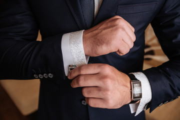 Mans hands with cufflinks. Elegant gentleman clother