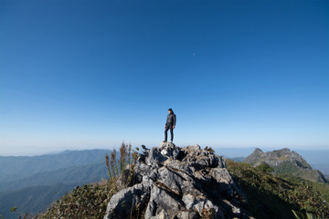 Mountain top with southeast asian man