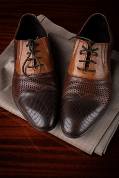 Stylish man's shoes and a suit