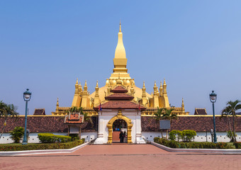 Fototapeta premium front view of wat pha that luang golden buddhist pagoda landmark of Vientiane,Laos. 