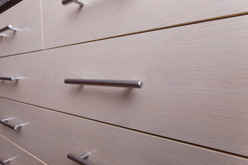 wooden wardrobe drawer front, metal handle