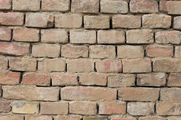 Old red bricks wall as background