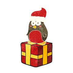 retro cartoon robin on present