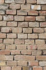 Old red bricks wall as background
