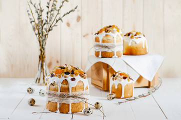 Traditional Easter bread, sprigs of willow on a wooden table