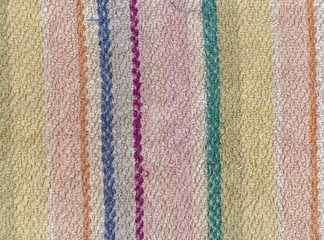 Old color bath towel texture with stripes.