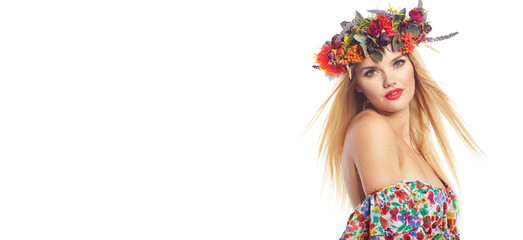 Fototapeta na wymiar Wonderful blonde lady with wreath from flowers on head