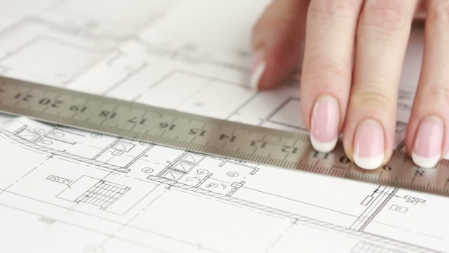 Hand of designer drawing the apartment