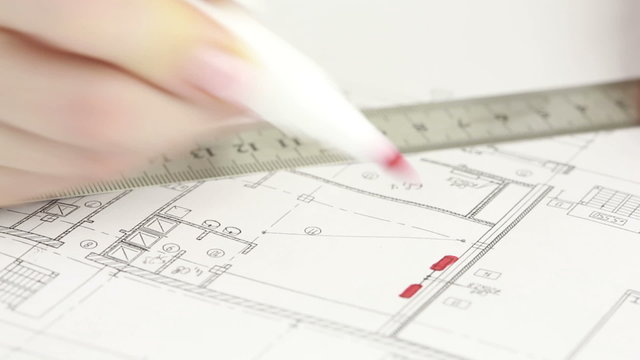 Hand of designer drawing the apartment