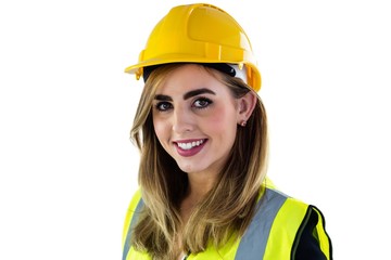 Smiling woman wearing construction clothing