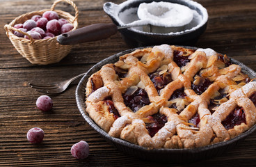 Delicious cake with cherries and icing sugar