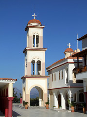 Obraz premium Bell Tower of Church Pedros and Pavlos in beautiful, traditional village Spili - Crete, Greece